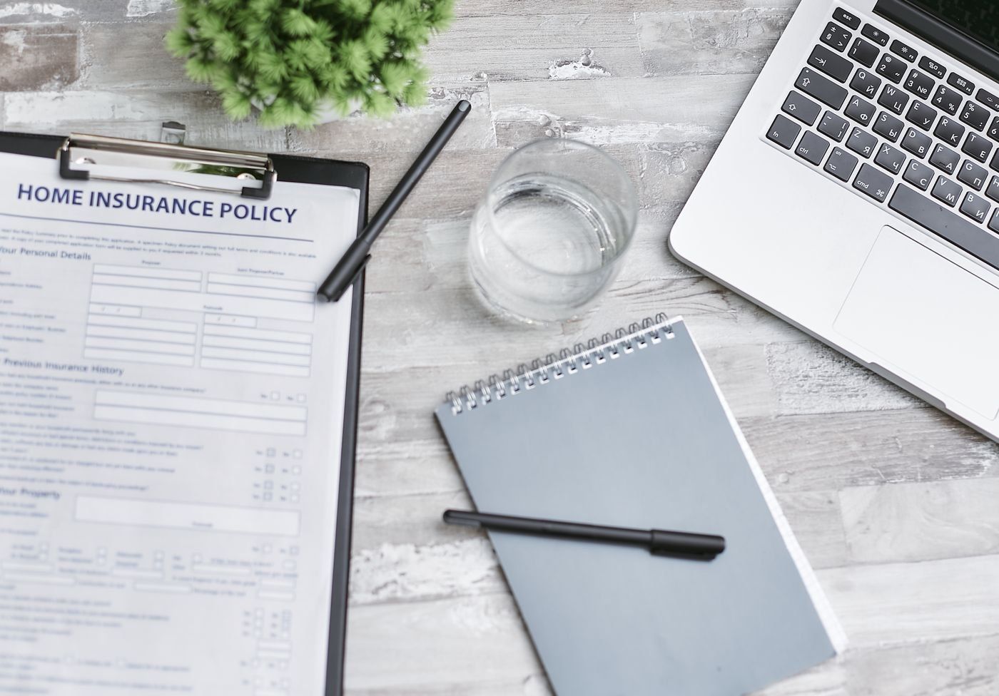 Two property-damage repair estimates compared side by side