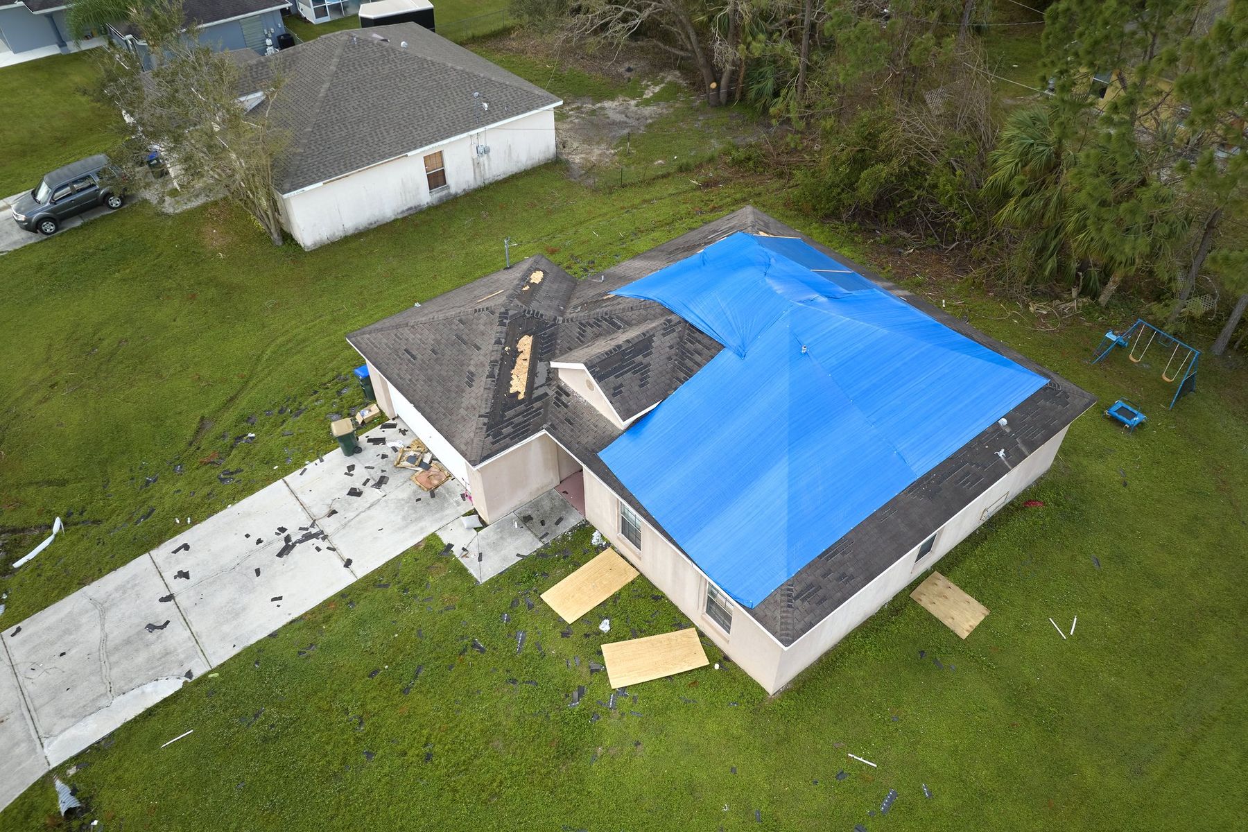 Storm-damaged neighborhood from above